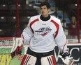 Spitfires goalie Jordan DeKort takes a break during training camp at the WFCU Centre in Windsor. Monday, DeKort stopped 13 of 14 shots in a 5-3 exhibition win over the Plymouth Whalers.  (DAN JANISSE/The Windsor Star)