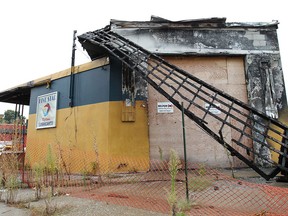 The former Five Star Oil Change business in the 1000 block of Tecumseh Rd. E. in Windsor, Ont. has been an eyesore for a year. It was heavily damaged by fire. (DAN JANISSE/The Windsor Star)