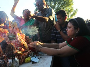 Windsor s Hindu community celebrates the Ganesh Festival on the riverfront at McKee Park in Windsor on Wednesday, September 18, 2013.               (TYLER BROWNBRIDGE/The Windsor Star)