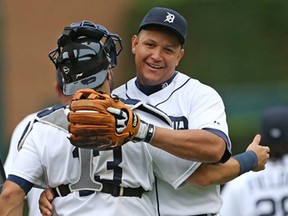 Detroit's Miguel Cabrera, right, and Alex Avila celebrate a 3-2 win over the  Kansas City Royals at Comerica Park September 15, 2013 in Detroit. (Leon Halip/Getty Images)