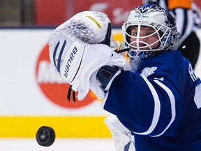 Leafs goalie James Reimer makes a save against the Ottawa Senators during NHL pre-season action in Toronto on Tuesday, Sept. 24, 2013. (THE CANADIAN PRESS/Nathan Denette)