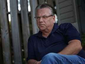 Retiring CAW national president Ken Lewenza sits in his backyard during a recent interview with the Windsor Star. (DAX MELMER/The Windsor Star)