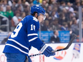 Maple Leafs forward Joffrey Lupul skates to the bench after taking a hard hit against the Philadelphia Flyers in Toronto on Thursday, April 4, 2013. (THE CANADIAN PRESS/Nathan Denette)