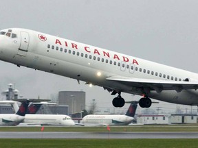 An Air Canada jet takes off from Dorval airport in this file photo. (Postmedia News files)