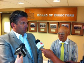 "This is very exciting." Windsor Regional Hospital CEO David Musyj, left, and WRH chief of staff Dr. Gary Ing talk to reporters Thursday, Sept. 5, 2013, on the big hospitals realignment in Windsor that takes place Oct. 1. (Doug Schmidt/The Windsor Star)