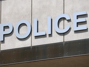 The logo above the downtown headquarters of the Windsor Police Service is shown in this 2012 file photo.