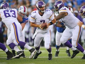 Minnesota QB Christian Ponder, centre, prepares to hand off against Buffalo during pre-season action at Ralph Wilson Stadium last month in Orchard Park, New York. Ponder will lead the Vikings against the Lions Sunday at Ford Field in Detroit. (Rick Stewart/Getty Images)