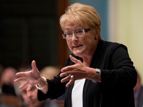 In this file photo, Quebec Premier Pauline Marois respond to Opposition questions as the legislature resumes for its fall session Tuesday, September 17, 2013 at the legislature in Quebec City. THE CANADIAN PRESS/Jacques Boissinot