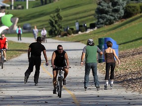 In this file photo, members of the public take advantage of pleasant weather on Windsor's riverfront trail on Oct. 25, 2012. (Tyler Brownbridge / The Windsor Star)