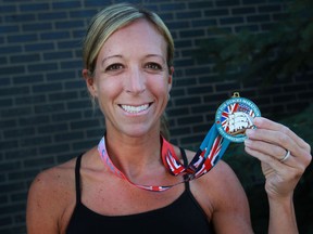 Meredith Fitzmaurice, 34, pictured Monday, Sept. 23, 2013, won the woman's full marathon at the Run for Heroes Marathon in Amherstburg, Ont.  (DAX MELMER/The Windsor Star)