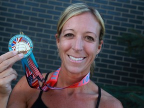 Meredith Fitzmaurice, 34, won the woman's marathon at the Run for Heroes Marathon in Amherstburg last weekend. (DAX MELMER / The Windsor Star)