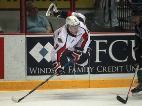 Windsor's Nikita Yazkov, soars through the air after getting tripped up against Plymouth in exhibition play at the WFCU Centre, Monday, Sept. 2, 2013. The Spitfires beat the Whalers 5-3. (DAX MELMER/The Windsor Star)