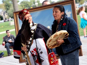 Patricia Shawnoo (right), a descendant of Chief Tecumseh, sings to a large crowd at the 1812 Bicentennial Celebration at Lakewood Park North in Tecumseh on Saturday, Sept. 21, 2013. (JOEL BOYCE/The Windsor Star)