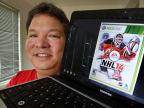 Tecumseh's Kurt Winkler is disappointed an audio glitch with EA Sports NHL 14 has not been repaired September 19, 2013. On NHL 14, the WFCU Centre is introduced as "WCFU Centre, plain as day," said Winkler. (NICK BRANCACCIO/The Windsor Star)
