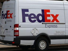 FedEx Express delivery truck departs a business on Ouellette Ave. October 3, 2013.  The company will anchor a new cargo hub at Windsor International Airport. (NICK BRANCACCIO/The Windsor Star)