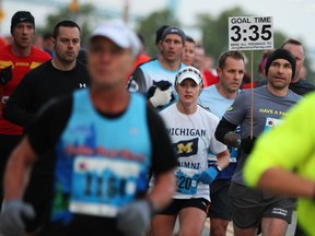 Thousands of runners participate in the Detroit Free Press/Talmer Bank Marathon as they run along Riverside Dr. W, Sunday, Oct. 20, 2013.  (DAX MELMER/The Windsor Star)