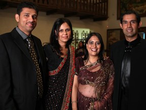 Raj Atikukke, left, Sabeena Misra, Monica Bagga and Amit Bagga, attend the India Canada Association gala at the Fogolar Furlan Club, Friday, Oct. 18, 2013.  Proceeds from the gala will benefit the The Kidney Foundation of Canada. (DAX MELMER/The Windsor Star)