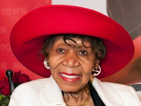 In this Aug. 26, 2013, file photo originally provided by the Motown Museum, Maxine Powell smiles during an event held in her honour at the Motown Museum in Detroit. Powell, who was responsible for developing the charm, grace and style of Motown Records’ artists during the Detroit label’s 1960s heyday, died Monday, Oct. 14, 2013. She was 98.  (AP Photo/Motown Museum, Andre Smith, File)