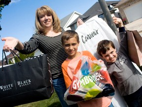 Windsor resident Linda Wooden finished her holiday shopping in the U.S. with her two boys, Joshua,7, and Connor, 5, Monday, Oct. 14, 2013. Wooden was born and raised in Livonia, Mich. and moved to Windsor in 2002, but she still does most of her shopping across the border. (JOEL BOYCE/The Windsor Star)