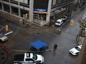 Windsor police investigate an early morning fatal stabbing at the intersection of Park St. and Pelissier St. Saturday, Oct. 19, 2013.   (DAX MELMER/The Windsor Star)
