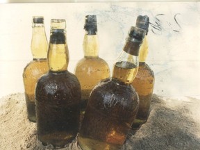 Full bottles from the wreck of the Canadian steamer Regina will be auctioned off in Michigan later this month and they likely have a Windsor connection. Although they aren't Hiram Walker's whisky, a logbook found on the body of the captain says the ill-fated ship took on cargo in Walkerville before it sank. (Handout)