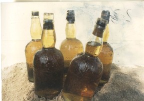 Full bottles from the wreck of the Canadian steamer Regina will be auctioned off in Michigan later this month and they likely have a Windsor connection. Although they aren't Hiram Walker's whisky, a logbook found on the body of the captain says the ill-fated ship took on cargo in Walkerville before it sank. (Handout)