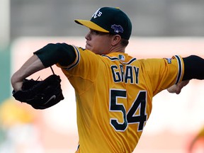 Oakland's Sonny Gray throws a pitch against the Detroit Tigers in the first inning of Game 5 of the American League Division Series in Oakland. (Photo by Thearon W. Henderson/Getty Images)