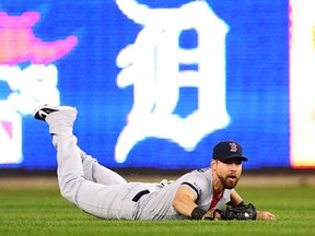 Boston's Jacoby Ellsbury catches a ball hit by Detroit's Omar Infante in the second innning during Game 4 of the American League Championship Series at Comerica Park. (Photo by Ronald Martinez/Getty Images)