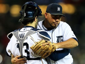 Detroit's Joaquin Benoit, right, and Alex Avila celebrate their 7-3 win over the Boston Red Sox in Game 4 of the American League Championship Series at Comerica Park. (Photo by Jamie Squire/Getty Images)