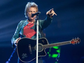 Bon Jovi performs in concert at Honda Center on Wednesday, Oct. 9, 2013 in Anaheim, Calif. There is speculation that the rocker will perform a benefit concert for the Duke and Duchess of Cambridge. (Paul A. Hebert/Invision/AP)