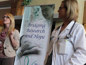 Dr. Lisa Porter, left, and Dr. Caroline Hamm speak during a kickoff event for a new cross border cancer research program in Windsor on Monday, October 7, 2013. The program named Passports was created to establish a global cancer research office that will foster cross-border collaborations and lay the foundation for international clinical trail access for Windsor cancer patients.              (TYLER BROWNBRIDGE/The Windsor Star)