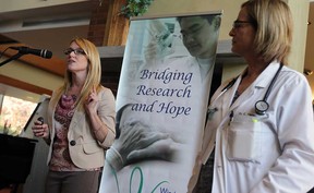 Dr. Lisa Porter, left, and Dr. Caroline Hamm speak during a kickoff event for a new cross border cancer research program in Windsor on Monday, October 7, 2013. The program named Passports was created to establish a global cancer research office that will foster cross-border collaborations and lay the foundation for international clinical trail access for Windsor cancer patients.              (TYLER BROWNBRIDGE/The Windsor Star)