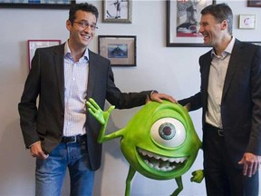 In this file photo, Mayor Gregor Robertson, right, and Amir Nasrabadi of Pixar, during a tour of Vancouver's digital media industry. Pixar is located in Vancouver's Gastown.  (Ward Perrin, PNG)