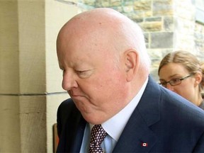 In this file photo, Senator Mike Duffy arrives on Parliament Hill, in Ottawa, Wednesday, June 5, 2013. (THE CANADIAN PRESS/Fred Chartrand, Postmedia News)