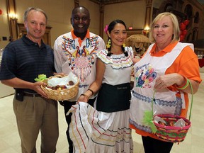 Brian Cutler, left, Gerald Phillips, Salenska Sobalvarro and Fiona Dixon attend the Community Living Windsor Fiesta Capacita gala at the Ciociaro Club in Windsor on Friday, September 27, 2013.                (TYLER BROWNBRIDGE/The Windsor Star)