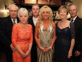 Gary Parent, Arden Parent, Bill Mitchell, June Muir, Shirley Gould and Ray Gould (left to right) attend the Plentiful Harvest Gala at the Fogolar Furlan Club in Windsor on Friday, September 20, 2013. (TYLER BROWNBRIDGE/The Windsor Star)