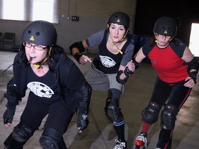 Kate Hargreaves, centre, is seen playing Roller Derby in this file photo. (Nick Brancaccio/The Windsor Star)