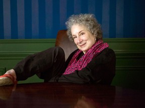 Writer Margaret Atwood poses for a photo as she promotes her new book "MaddAddam" in Toronto on Wednesday August , 2013. THE CANADIAN PRESS/Chris Young