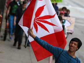 Approximately 150 people took part in the first Windsor Marijuana March in downtown Windsor, Saturday, Oct. 5, 2013. Letter writer Nancy Demers of Tilbury says the use of a marijuana motif is disrespectful to the Canadian flag.(DAX MELMER/The Windsor Star)