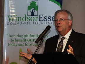 Glenn Stresman, executive director WindsorEssex Community Foundation, is shown at the podium during the VitalSigns report meeting held at The Windsor Star's News Cafe October 1, 2013.  (NICK BRANCACCIO/The Windsor Star)