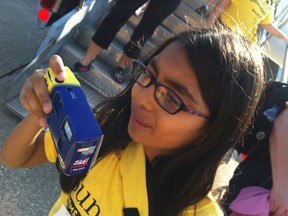 "Where dreams come true" -- Dhvani Patel, 12, captures the action during the Sunshine Foundation's 54th DreamLift Tuesday from Windsor to Disney World and back. (Doug Schmidt/The Windsor Star)