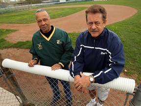 Ralph Hall, left, and Jack McCart take a break in 2011 at the baseball diamond that bear their names in LaSalle. (TYLER BROWNBRIDGE/The Windsor Star)