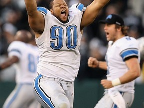 Detroit's Ndamukong Suh celebrates after they beat the Oakland Raiders. (Photo by Ezra Shaw/Getty Images)