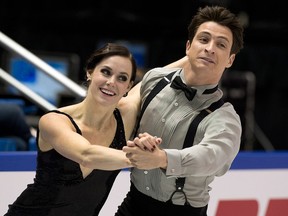 Tessa Virtue, left, and Scott Moir compete in the ice dance short program Friday at Skate Canada International in Saint John, N.B. (THE CANADIAN PRESS/Andrew Vaughan)