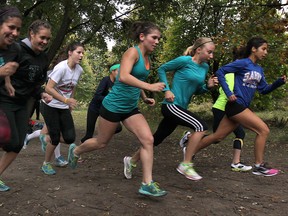 Members of the University of Windsor Lancer cross-country team train at Malden Park in Windsor. (DAN JANISSE/The Windsor Star)