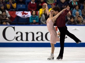 U of W student Tessa Virtue, left, and Scott Moir skate during the ice dance free program at Skate Canada International at Harbour Station in Saint John, New Brunswick. (Photo by Dave Sandford/Getty Images)