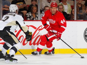 Detroit's Todd Bertuzzi, right, is checked by Pittsburgh's Matt Niskanen at Joe Louis Arena. (Photo by Gregory Shamus/Getty Images)