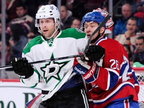 Montreal's Josh Gorges, right, checks Rich Peverley of the Stars at the Bell Centre Tueday. (Photo by Richard Wolowicz/Getty Images)