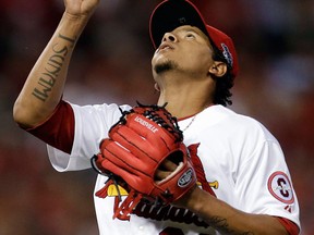 St. Louis relief pitcher Carlos Martinez celebrates after striking out Pittsburgh's Jordy Mercer to end the top of the eighth inning Thursday. (AP Photo/Jeff Roberson)