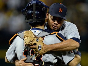Detroit's Joaquin, right, hugs catcher Alex Avila after defeating the Oakland A's in Game 1 of the American League Division Series at O.co Coliseum Friday in Oakland. (Photo by Thearon W. Henderson/Getty Images)